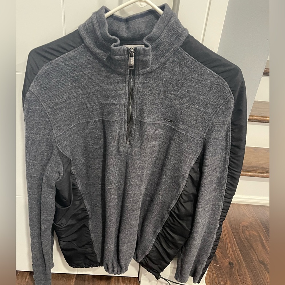 Calvin Klein sweaters .